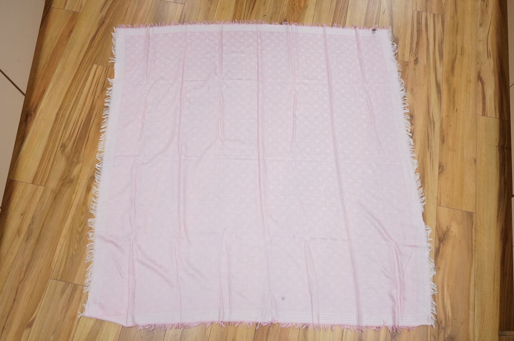 A Louis Vuitton silk Monogram Poodle Animalle Bandeau scarf and a pale pink Louis Vuitton fringed scarf
